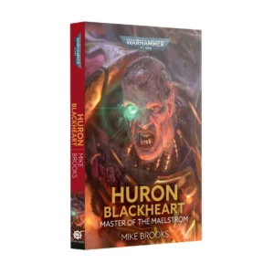 A three-quarters perspective product shot of the paperback book Huron Blackheart: Master of the Maelstrom (Paperback) (Anglais) standing upright on a seamless white background, showing its spine and front cover. The book's spine features a split design with a red upper half and a black lower half. The vertical text displays the red "Warhammer 40,000" logo, the title "HURON BLACKHEART" in gold, and the author's name "MIKE BROOKS" in white. A small portrait of Huron's face and the white circular Black Library logo are printed near the bottom. The front cover features a highly detailed, dark illustration of Huron Blackheart’s cybernetically augmented face. His head is reinforced with riveted metal plates, his right eye is replaced by a glowing green bionic lens, and his face is locked in a furious snarl that exposes iron teeth. Mechanical cables wrap around his neck above his ornate gold-trimmed armor. The silver "WARHAMMER 40,000" logo is positioned at the top. The bottom of the cover showcases the title "HURON BLACKHEART" in bold gold capital letters, the subtitle "MASTER OF THE MAELSTROM" in white capital letters, and the author’s name "MIKE BROOKS" in gold.