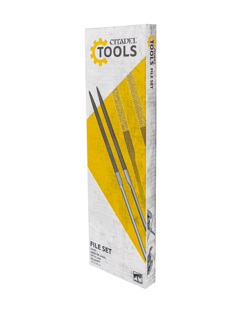 Boîte d'emballage allongée pour le Jeu de Limes de la gamme Citadel Tools. La face avant présente un fond clair à texture quadrillée, surmonté du logo « CITADEL TOOLS » avec son engrenage jaune emblématique. L'illustration centrale met en valeur deux limes métalliques de précision posées sur un motif géométrique jaune vif. En bas du coffret, le titre « FILE SET » est accompagné du terme français « LIMES », tandis que le logo officiel Warhammer apparaît dans le coin inférieur droit.