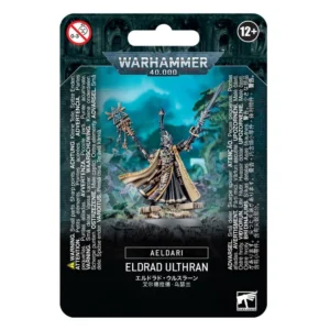 Emballage sous blister officiel d'une figurine de personnage pour le jeu de stratégie Warhammer 40,000, présenté de face avec une fente d'accroche au sommet. Le grand logo argenté de Warhammer 40,000 est centré en haut, incrusté sur une bordure supérieure gris foncé sculptée de reliefs de visages hurlants. L'illustration centrale met en scène Eldrad Ulthran, le plus puissant et légendaire Grand Prophète de la faction Aeldari. Le personnage arbore une armure baroque noire et dorée très détaillée, de longues robes noires, et une grande cape beige à doublure bordeaux ornée de runes dorées. Il porte un casque conique noir et doré à lentilles turquoise et se tient debout sur des ruines de pierre. De sa main droite, il brandit son grand bâton runique d'Ulthamar surmonté d'une icône géométrique complexe, tandis que sa main gauche tient une lame de sorcière argentée et turquoise pointée vers l'arrière. L'arrière-plan mystique est baigné d'une lueur turquoise. La partie inférieure noire comporte de grands encadrés textuels traduisant le nom du personnage en plusieurs langues, dont la mention blanche "AELDARI" et "ELDRAD ULTHRAN" juste en dessous. Les logos d'avertissement de sécurité pour les enfants et d'âge recommandé "12+" encadrent le haut, tandis que le logo blanc officiel de Warhammer Citadel figure dans le coin inférieur droit.