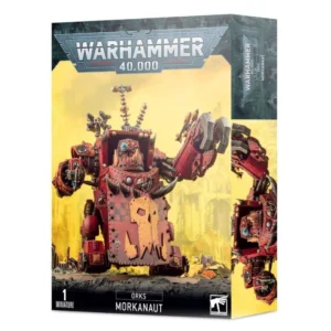 Boîte d'emballage officielle d'une figurine de véhicule pour le jeu de stratégie Warhammer 40,000, présentée de trois-quarts. Le grand logo argenté de Warhammer 40,000 domine le haut de la boîte sur une bordure supérieure gris foncé texturée de reliefs de visages hurlants. L'illustration centrale met en scène le Morkanaut, un immense robot de guerre mécanisé et massif construit par la faction extraterrestre des Orks. Ce marcheur blindé est peint en rouge brique avec des plaques de métal rivetées, affichant un grand symbole de crâne jaune ork stylisé sur sa plaque ventrale en damier. Il est équipé d'une pince mécanique géante à trois griffes d'un côté, d'un méga-blasta kustom de l'autre, et d'un râtelier d'antennes technologiques sur le dessus. Le blindage frontal imite un visage menaçant avec une mâchoire dentelée et un œil cybernétique bleu lumineux. Le véhicule progresse sur un sol de décombres gris foncé devant un arrière-plan urbain brumeux baigné d'une lueur jaune toxique révélant des ruines de bâtiments industriels. En bas au centre, une boîte noire épurée indique les mentions blanches "ORKS MORKANAUT", flanquées de l'inscription "1 MINIATURE" à gauche et du logo blanc officiel de Warhammer Citadel à droite. Le rabat latéral droit, bleu-vert sombre texturé, montre un gros plan vertical du marcheur mécanique.