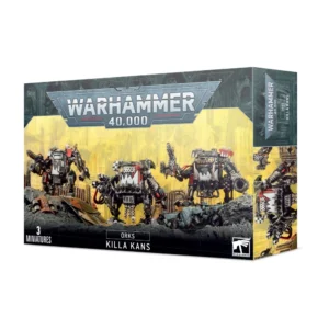 Boîte d'emballage officielle de Warhammer 40,000 présentant une unité de figurines pour l'armée des Orks. L'illustration principale, sur un fond jaune brumeux de cité industrielle en ruine, met en scène trois marcheurs de combat cybernétiques massifs connus sous le nom de Boit'Kitu Orks. Ces machines de guerre, construites en plaques de métal noir et de métal usé, arborent des visages agressifs stylisés avec des mâchoires à dents pointues peintes en blanc. Elles sont lourdement armées de scies circulaires, de pinces énergétiques et de lance-roquettes. Le logo officiel argenté "WARHAMMER 40,000" domine le haut de la boîte. La bande noire inférieure affiche les mentions textuelles "3 MINIATURES", "ORKS KILLA KANS" au centre, ainsi que le logo de Games Workshop dans le coin inférieur droit.
