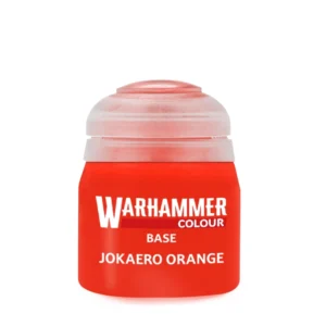 Pot de peinture acrylique officiel de la gamme Warhammer Colour affichant la couleur Base: Jokaero Orange. Le flacon transparent contient une peinture d'un orange vif et soutenu. L'étiquette frontale de couleur rouge porte le logo blanc et rouge « WARHAMMER COLOUR », suivi en dessous des inscriptions en lettres capitales blanches « BASE » et « JOKAERO ORANGE ». Le pot est fermé par son couvercle en plastique souple translucide caractéristique.